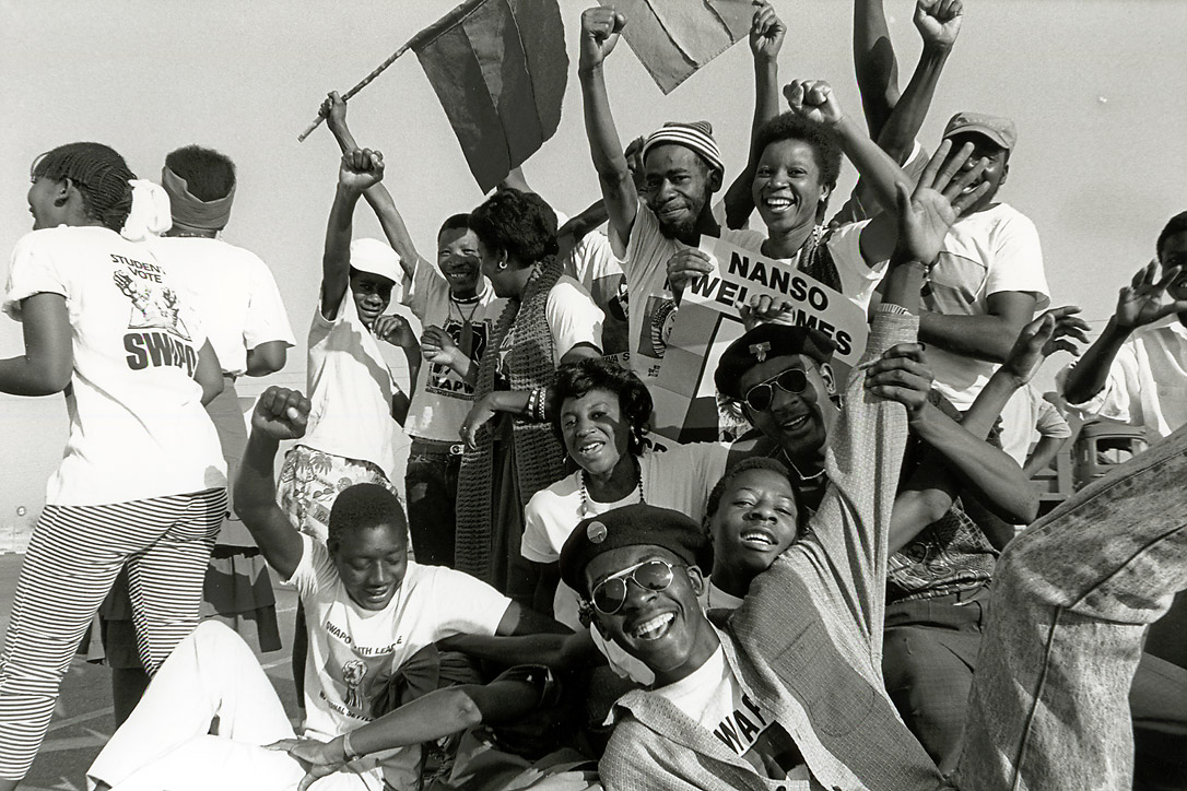 Namibian National Students Organisation members celebrate exiled SWAPO leader Sam Nujoma’s return from exile on 14 September 1989.