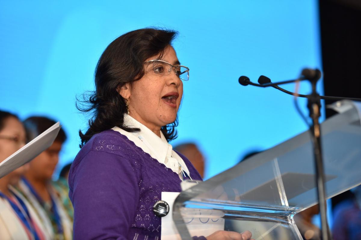 Delegate of the Women's Pre-assembly delivers the message to Twelfth LWF Assembly delegates. Photo: LWF/ Albin Hillert