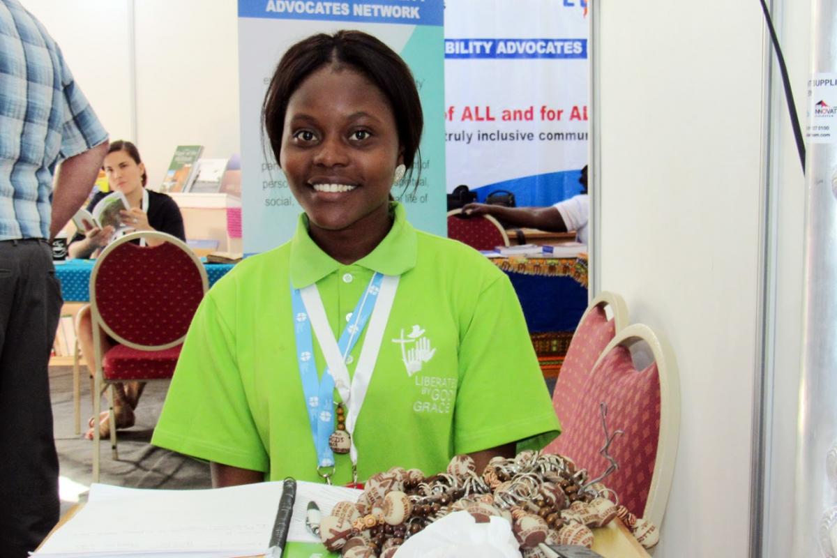 Julia Nekongo at the Omalata (marketplace) presenting Namibian art and craft products. Photo: LWF/Umesh Pokharel