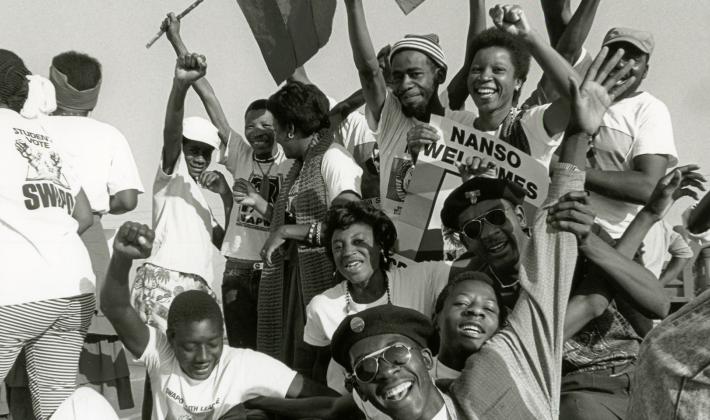 Students celebrate the return of exiled SWAPO leader Sam Nujoma on 14 September 1989 