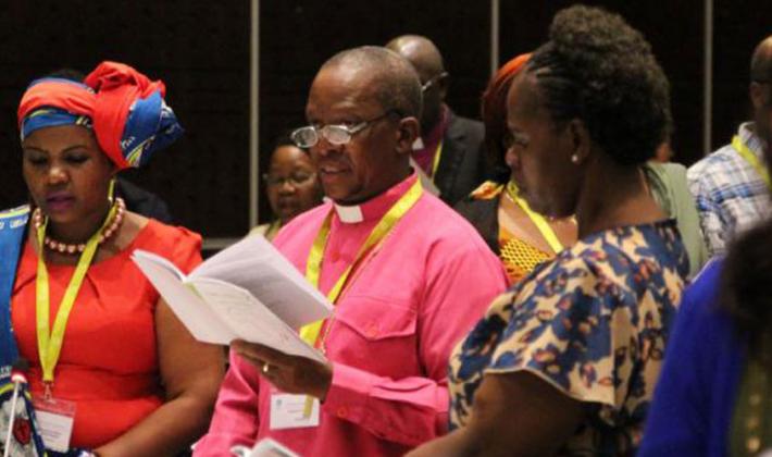 Faustina Manyangu, Evangelical Lutheran Church in Tanzania, Bishop Absalom Mnisi, ELCSA and Shoni Ngobeni, LUCSA at the opening worship of the LWF Africa Pre-Assembly. Photo: LWF/A. Weyermüller 